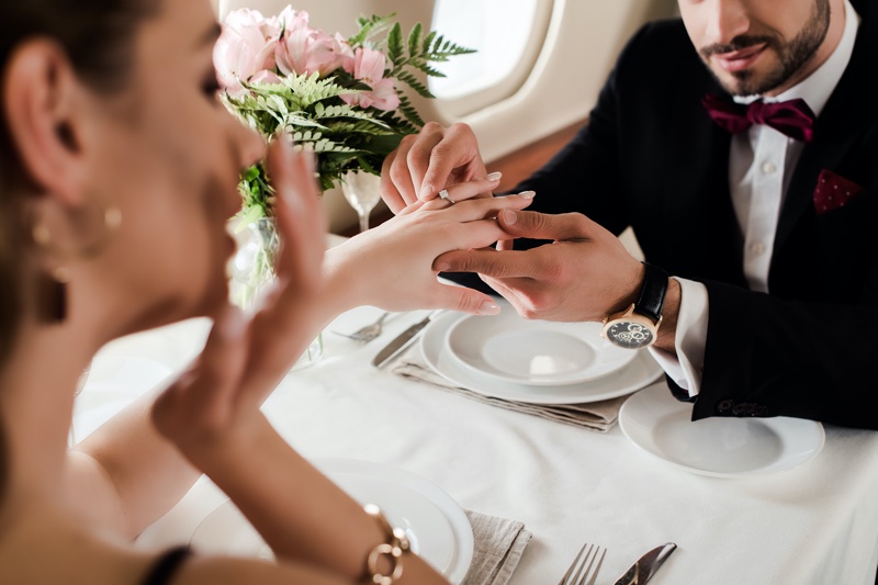 Man Proposal Placing Ring Woman's Finger