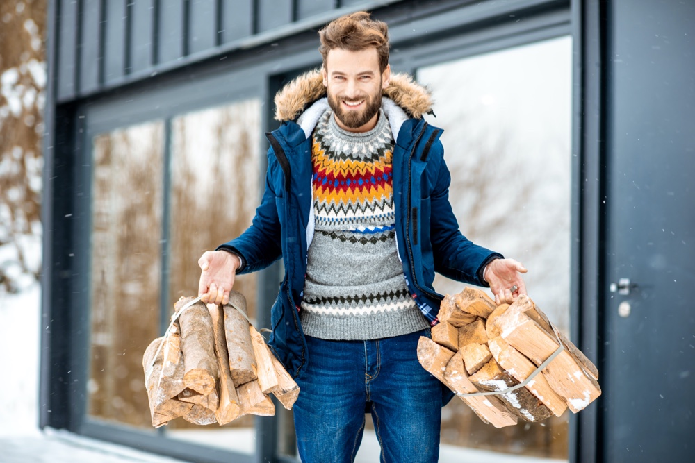 Man Winter Style Carrying Wood