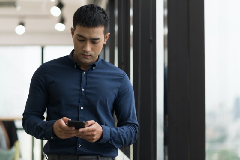 Man on Phone Office Setting
