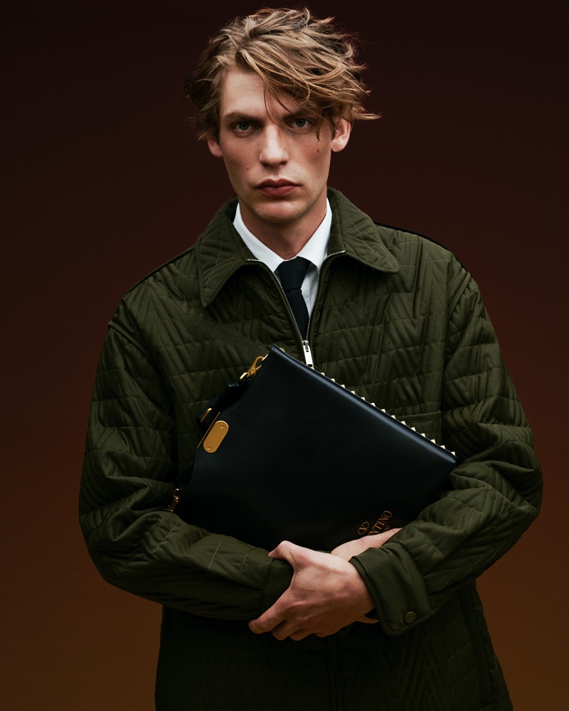 French model Baptiste Radufe wears a quilted Valentino jacket for Mytheresa's cruise 2022 campaign.