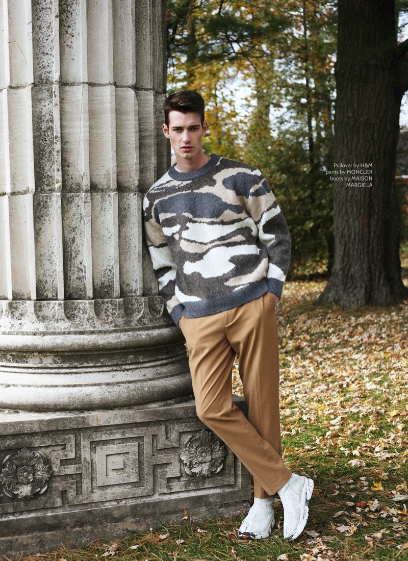 Robbie wears sweater H&M, pants Moncler, and boots Maison Margiela.