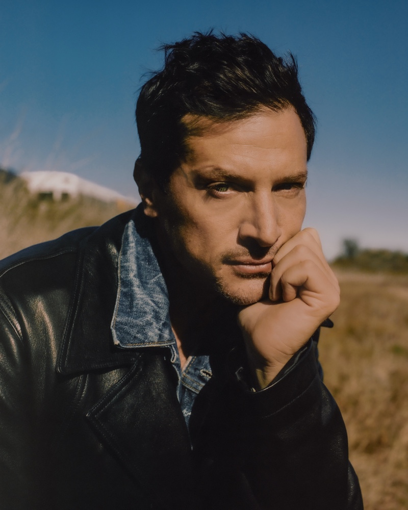 Simon Rex wears a Loewe leather jacket with a Levi's jean jacket for WSJ. magazine.