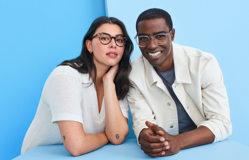 Warby Parker packs a smart collection for winter with its Taye glasses in Opal Tortoise (left) and Bodie in Crystal with English Oak (right).