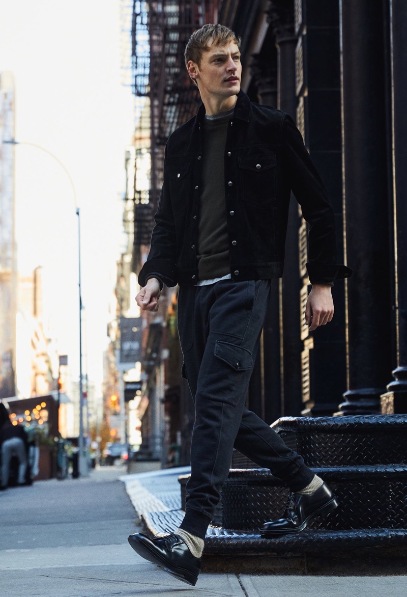 Making a case for timeless black, Roberto Sipos wears a Todd Snyder Italian suede snap Dylan jacket with a cashmere sweater, and utility cargo pants. Alden cordovan plain toe blucher shoes complete Roberto's look.