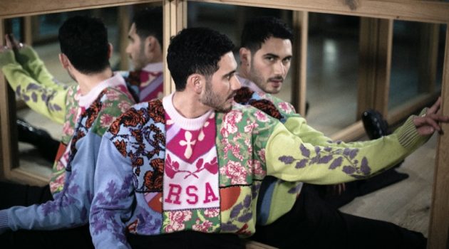 Alejandro Speitzer Promotes 'Dark Desire 2' in Versace Alejandro Speitzer Versace Sweater 2022 Style