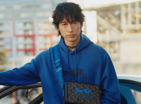 Going casual in Coach, Dean Fujioka fronts the brand's spring-summer 2022 campaign.