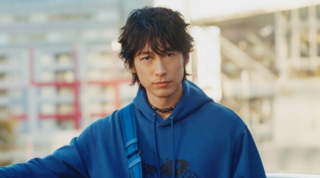 Going casual in Coach, Dean Fujioka fronts the brand's spring-summer 2022 campaign.