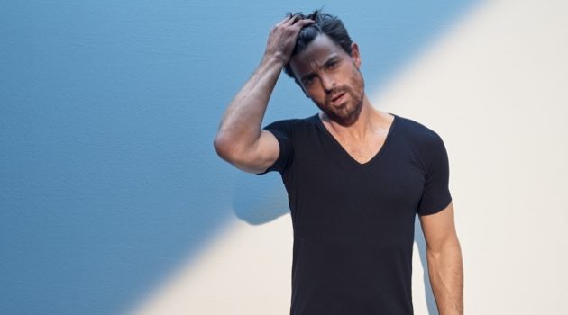FALKE Looks Out for Daily Comfort with New Underwear Essentials Dressed in black, Niko Ohlsson sports a FALKE Daily Climate V-neck shirt and underwear briefs.