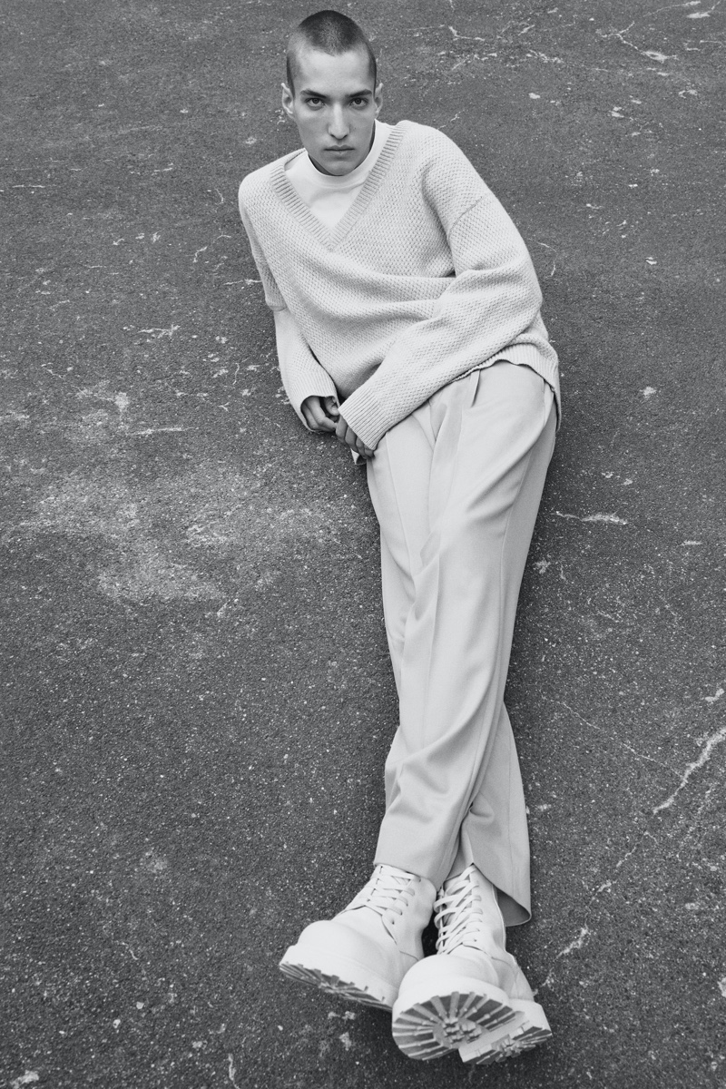 Embracing monochromatic style, Davyd Shyn fronts Filippa K's spring-summer 2022 men's campaign.