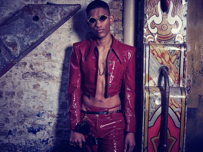 Brian Whitby wears a provocative leather look from Helen Anthony's spring-summer 2022 collection.