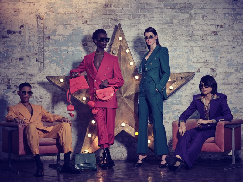 It's power suit hour as Brian Whitby, Emmanuel Adjaye, Claudia Lavender, and Sheldon Chang come together in Helen Anthony.
