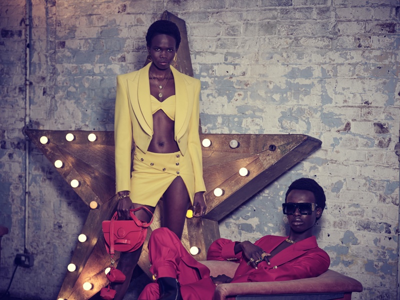 Hakima Duot and Emmanuel Adjaye wear colorful spring tailoring from Helen Anthony.