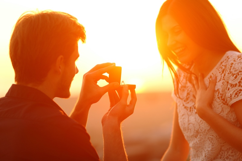 Man Proposing Woman Sun