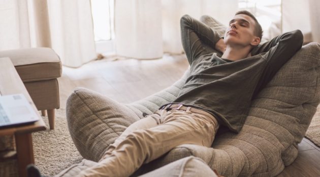 Ways to Relax After a Long Day Man Relaxing Couch Home Casual