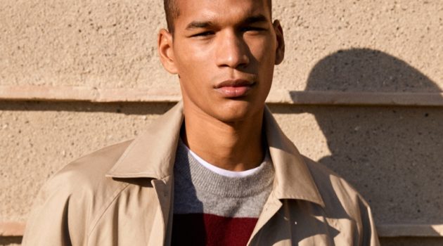 Mango Man Proposes Style for the Weekend Donning a classic trench, Hamady Hirailles also wears a striped crewneck sweater and jeans from Mango.