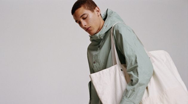 Rag & Bone Launches Future Staples Capsule Marco Pickett wears a linen parka from the Rag & Bone Future Staples capsule collection. He also carries an oversized tote from the range.