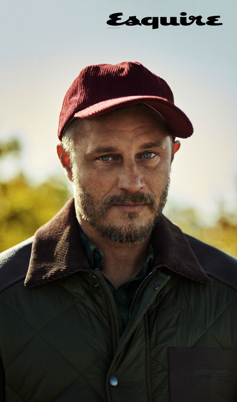Raised By Wolves star Travis Fimmel wears a Tod's jacket with a Double RL Ralph Lauren shirt and Nick Fouquet cap for Esquire Kazakhstan.