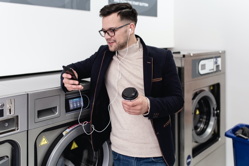 Well Dressed Man Doing Laundry Laundromat