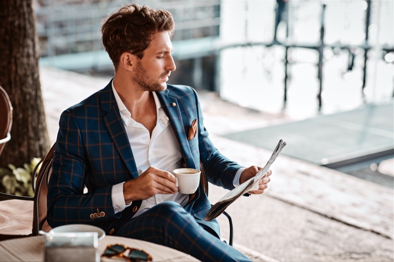 Well Dressed Man Windowpane Suit Sitting Reading