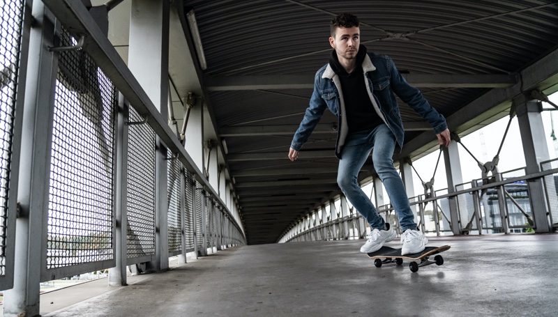 Young Man Skateboarding Jeans Denim Style