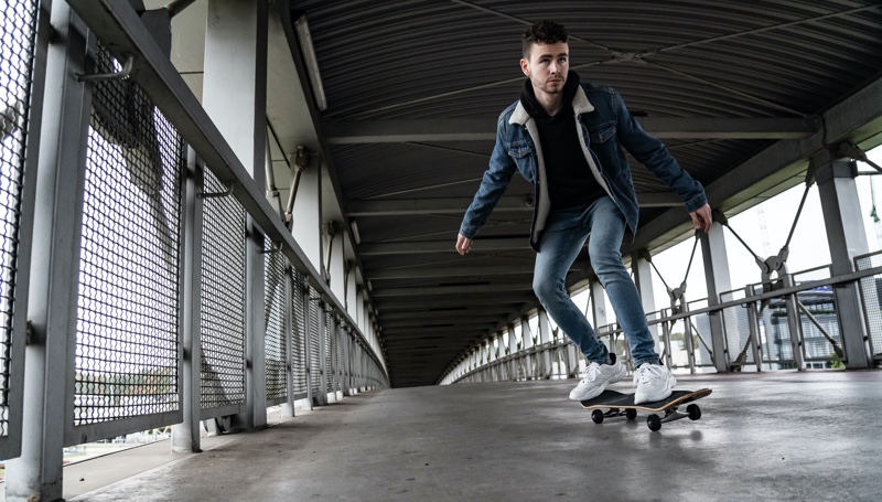 Young Man Skateboarding Jeans Denim Style Young Man Skateboarding Jeans Denim Style