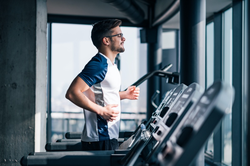 Attractive Man Running Treadmill