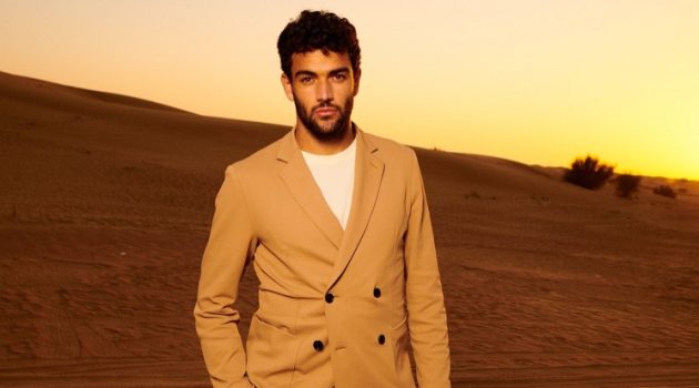 BOSS Makes a Grand Statement in Dubai Matteo Berrettini wears a tan double-breasted BOSS suit.