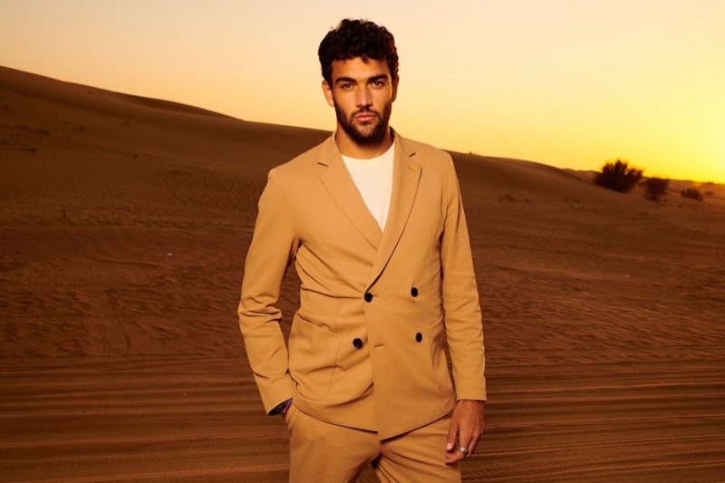 Matteo Berrettini wears a tan double-breasted BOSS suit.