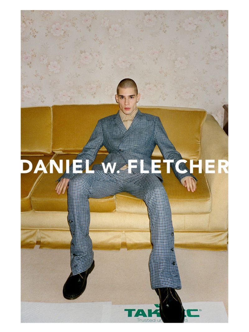 Patryk Lawry dons a check suit for Daniel W. Fletcher's spring-summer 2022 campaign.