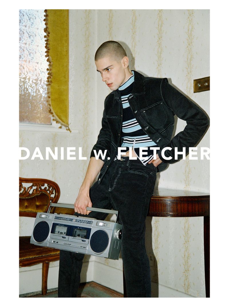 Doubling down on denim, Patryk Lawry stars in Daniel W. Fletcher's spring-summer 2022 campaign.