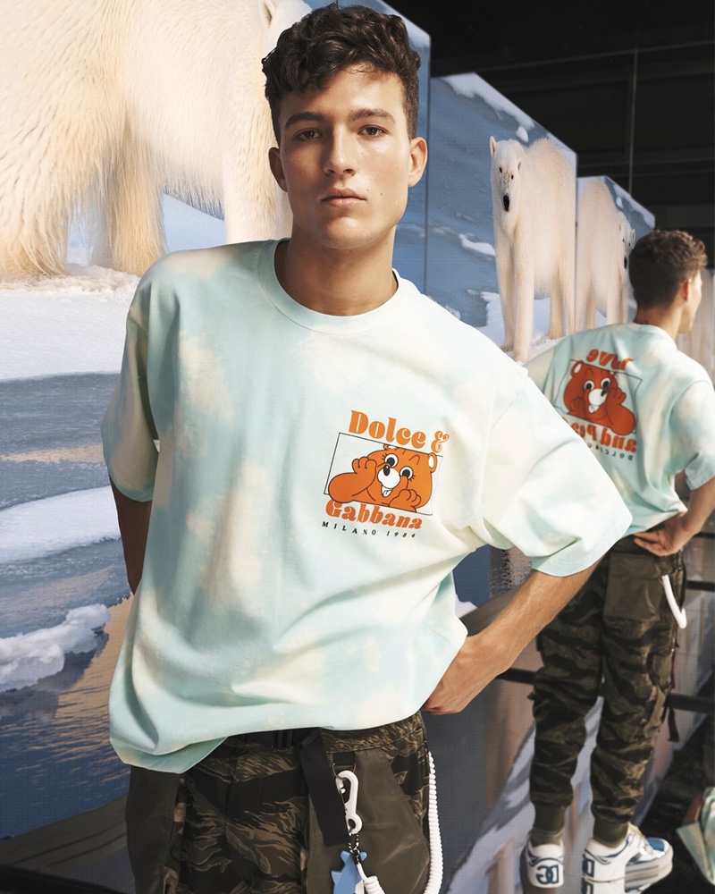 Luca Cobelli rocks a Dolce & Gabbana Teddy Ruxpin tee from the brand's spring-summer 2022 men's Reborn to Live collection.