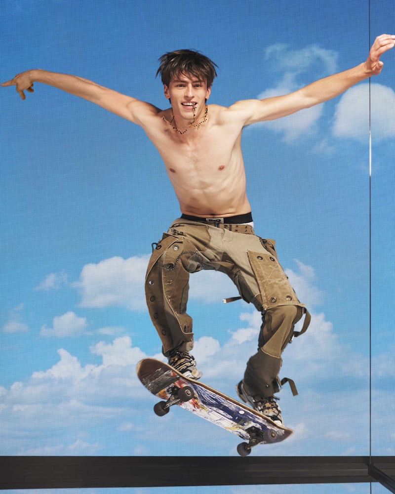 Clement Deheunynck skateboards in pants from Dolce & Gabbana's spring-summer 2022 men's Reborn to Live collection.