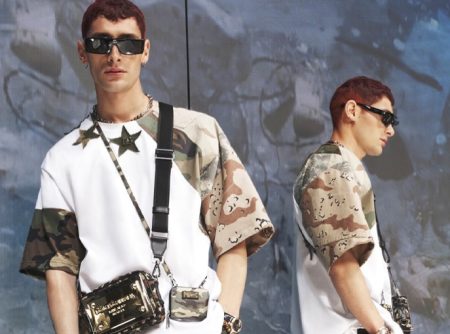 Nicolò Verde is a cool vision in a relaxed camouflage t-shirt from Dolce & Gabbana's spring-summer 2022 men's Reborn to Live collection.