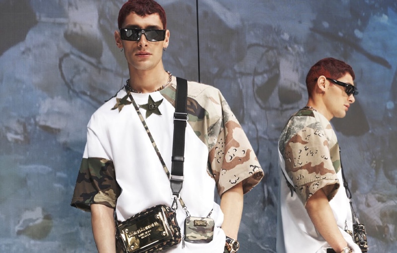 Nicolò Verde is a cool vision in a relaxed camouflage t-shirt from Dolce & Gabbana's spring-summer 2022 men's Reborn to Live collection.