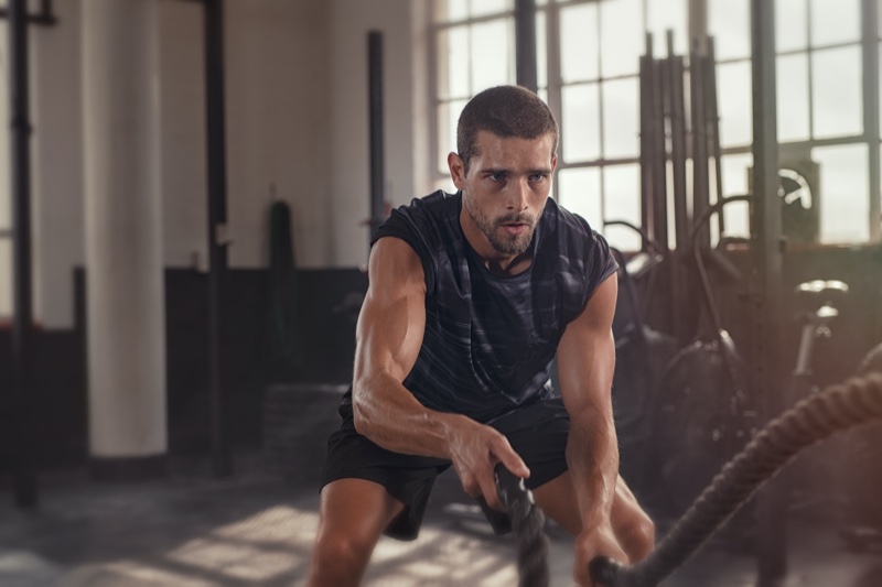 Fit Man Working Out Gym Arms