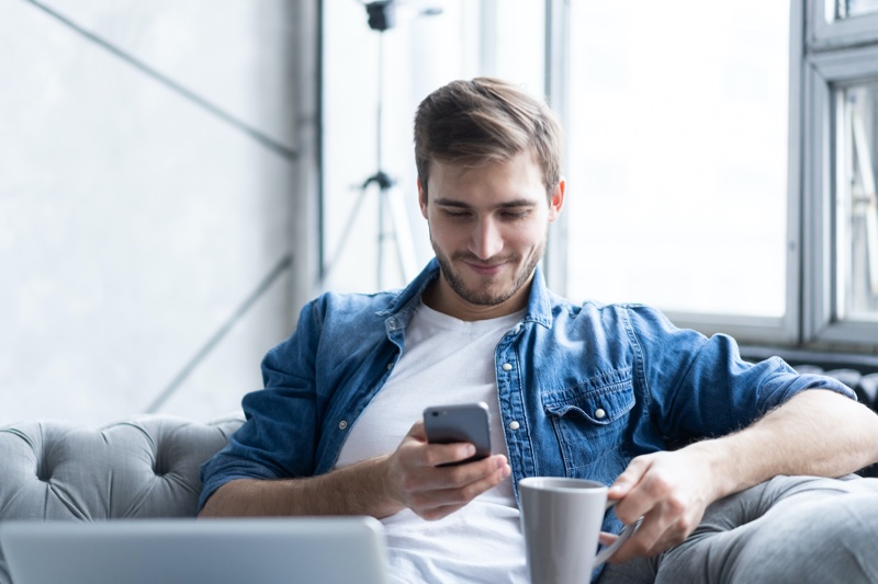 Guy Phone Smiling Denim Shirt » A Guy's Guide to Buying Clothes for His Girlfriend Guy Phone Smiling Denim Shirt