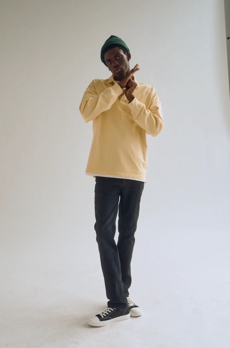 Ottawa Kwami dons a long-sleeve polo from H&M's Essentials range.