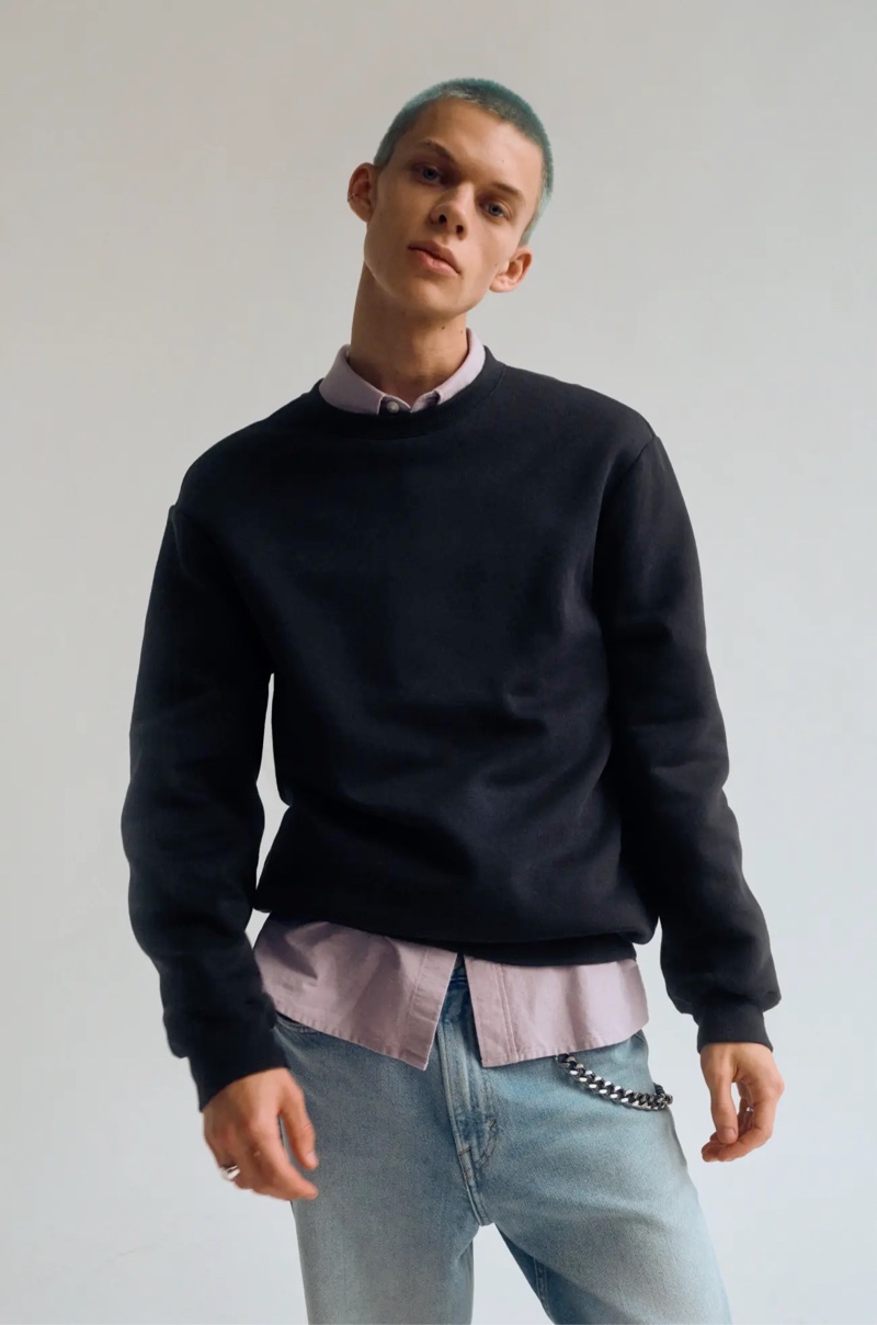 Ante Bergman rocks the sweatshirt with a pair of jeans for H&M's Essentials lineup.