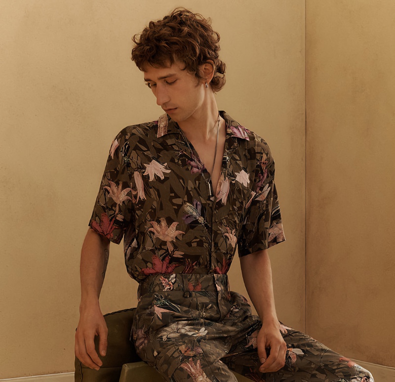 Making a case for CO-ORD style, Etienne de Testa  wears a matching floral shirt and pants from HUGO.