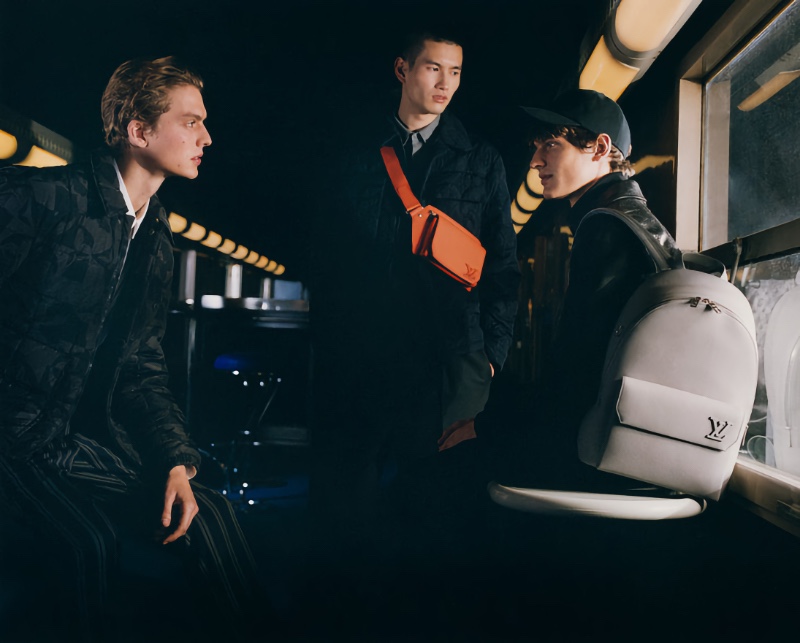 Models Leon Dame, Kohei Takabatake, and Valentin Caron appear in the Louis Vuitton Aerogram campaign.