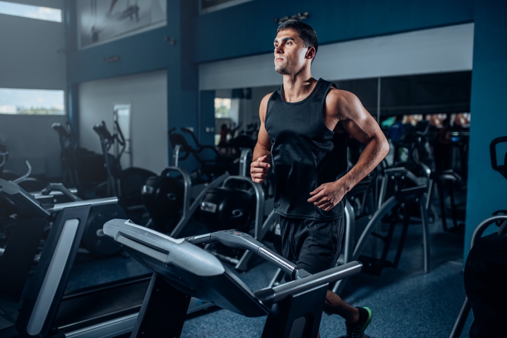 Man Running on Treadmill