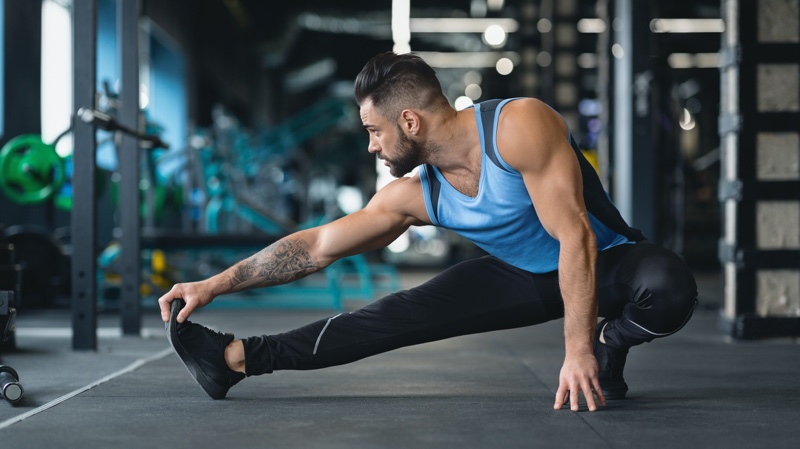 Man Stretching Gym