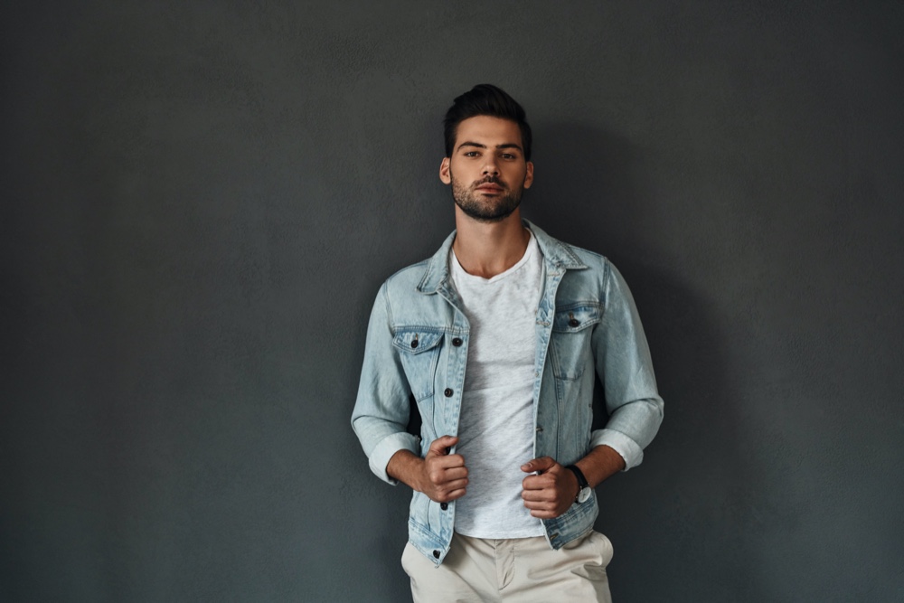 Man Wearing Jean Jacket with Tee and Khakis