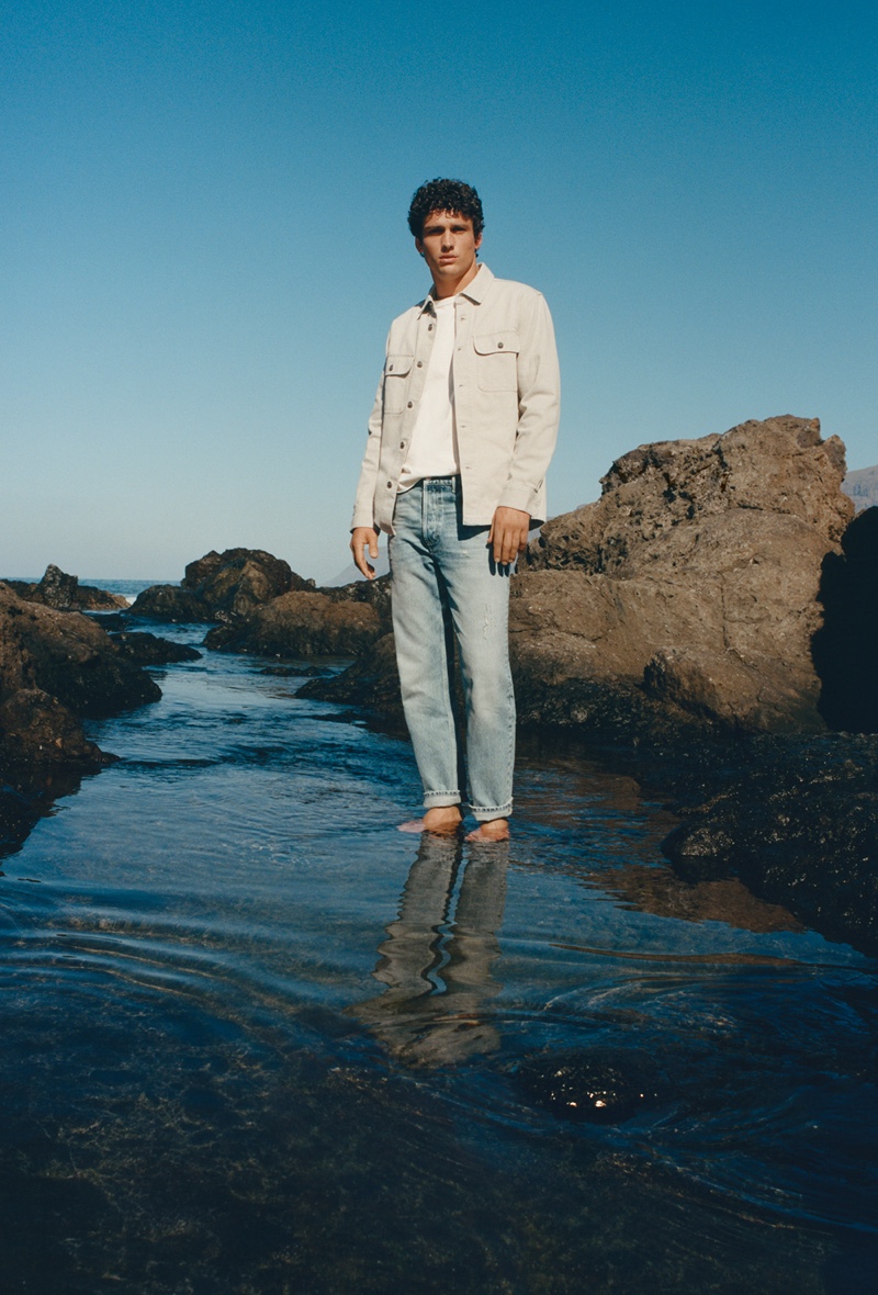 A chic vision, Simon Nessman fronts Mango Man's spring-summer 2022 denim campaign.