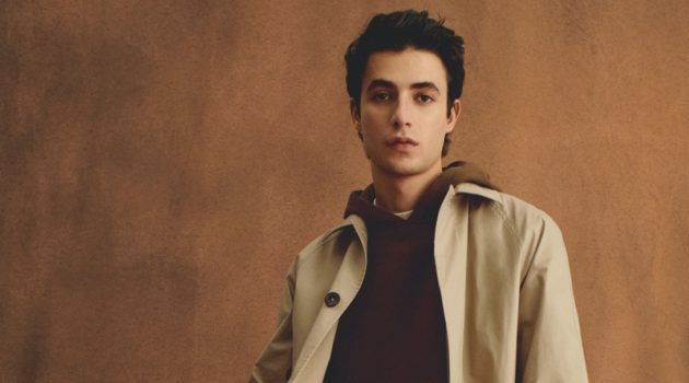 Mango Champions Neutral-Colored Outerwear Model Oscar Kindelan wears a light coat over a hoodie from Mango Man.