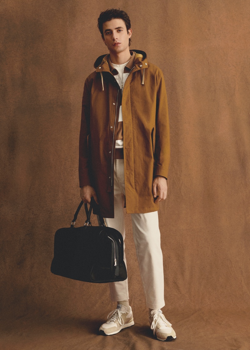 In front and center, model Oscar Kindelan sports a brown parka from Mango Man.