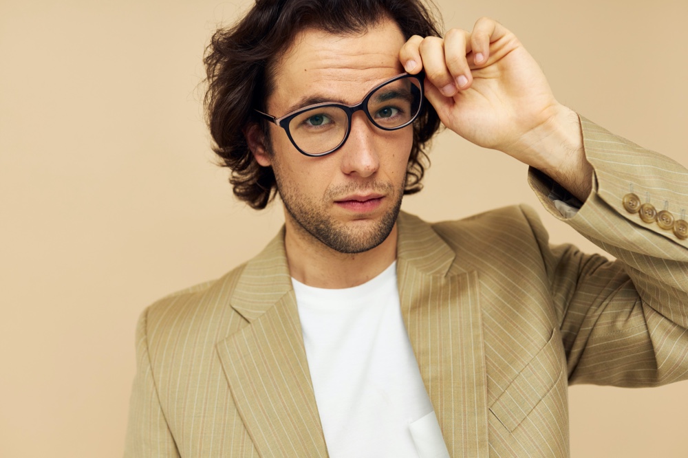 Model Wearing Suit Jacket Glasses Tilted