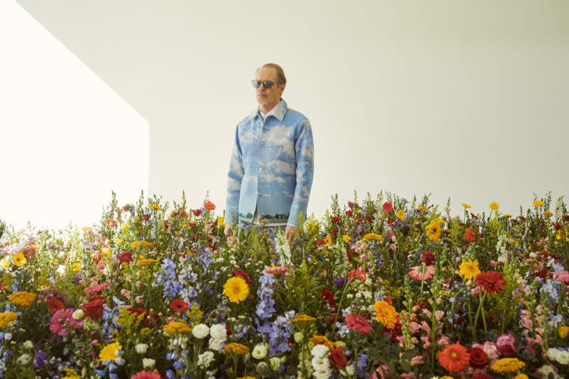 Steve Buscemi wears a cloud print jacket for KITH's spring 2022 campaign.