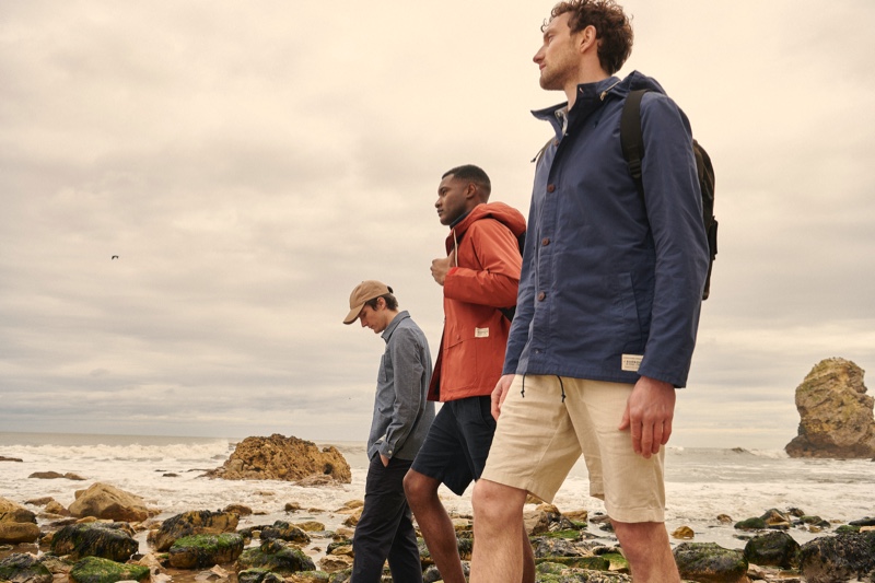 Models Charlie Timms, Jourdan Copeland, and Jacob Coupe showcase casual fashions from Barbour's 55 Degrees North collection.