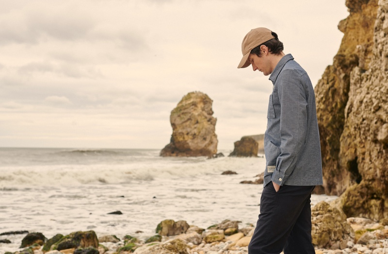 Taking in his surroundings, Charlie Timms showcases nautical influenced style from Barbour's 55 Degrees North collection.